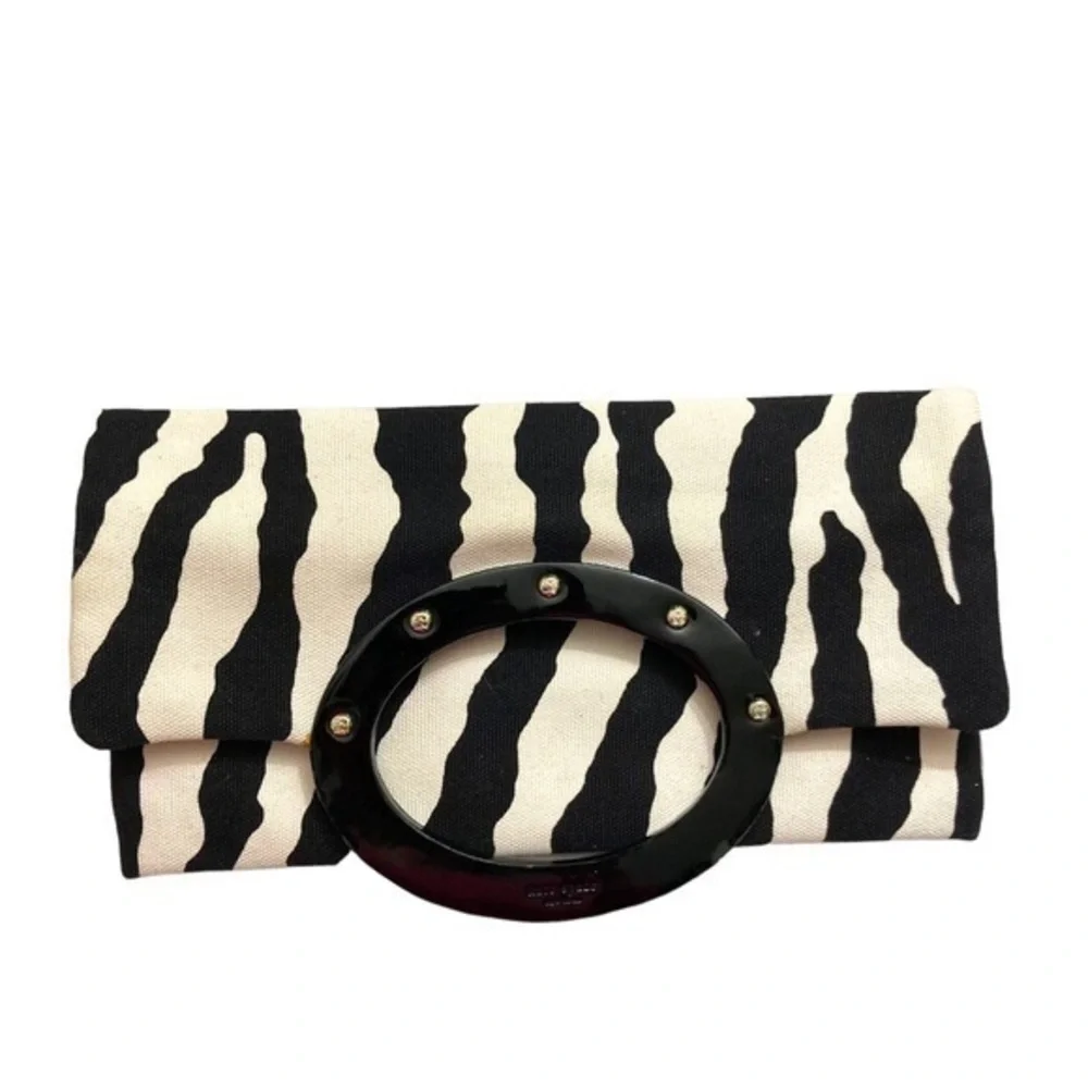 Kate spade zebra foldover top handle clutch bag